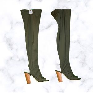 Green thigh high boots